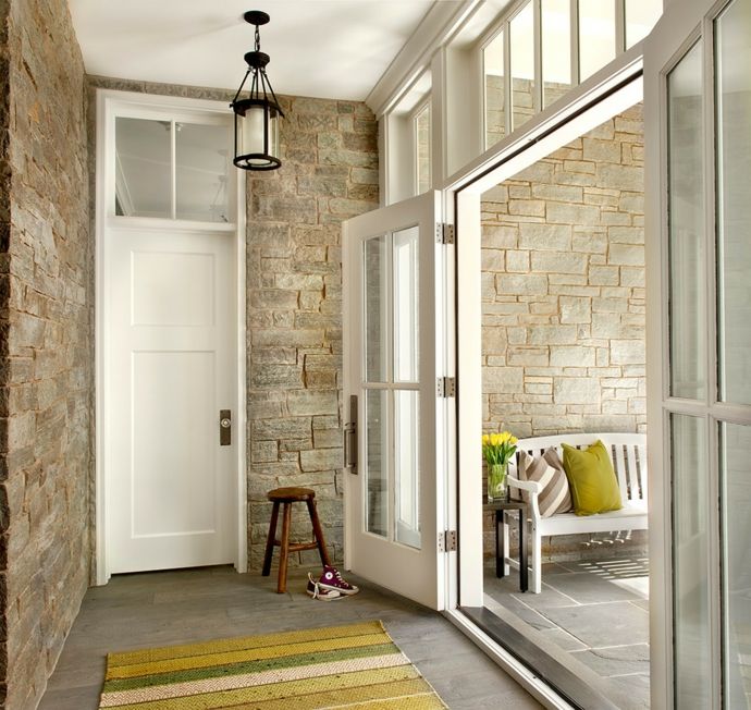 Entrance area stone wall bench French doors-hallway furnishings