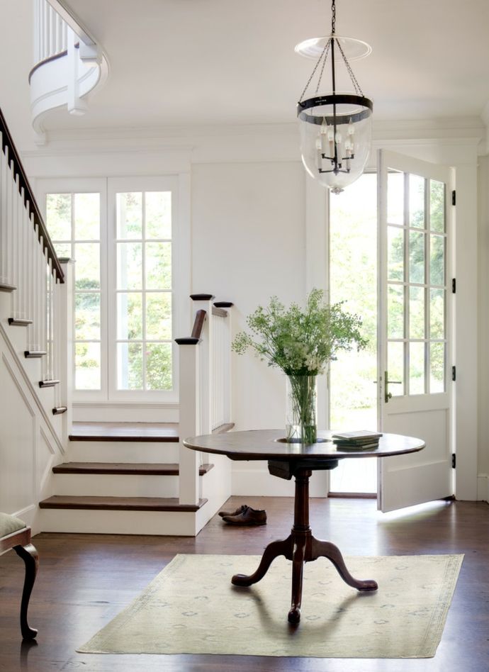 Foyer in white wooden elements Stair-hall furnishing