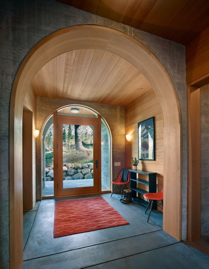 Front door made of glass mountain hut wood arched hallway furnishings