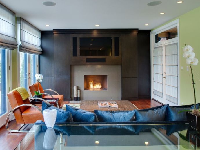 Fireplace Sofa Armchair Recessed spotlights Blue Orange Green White -Feng Shui in the living room