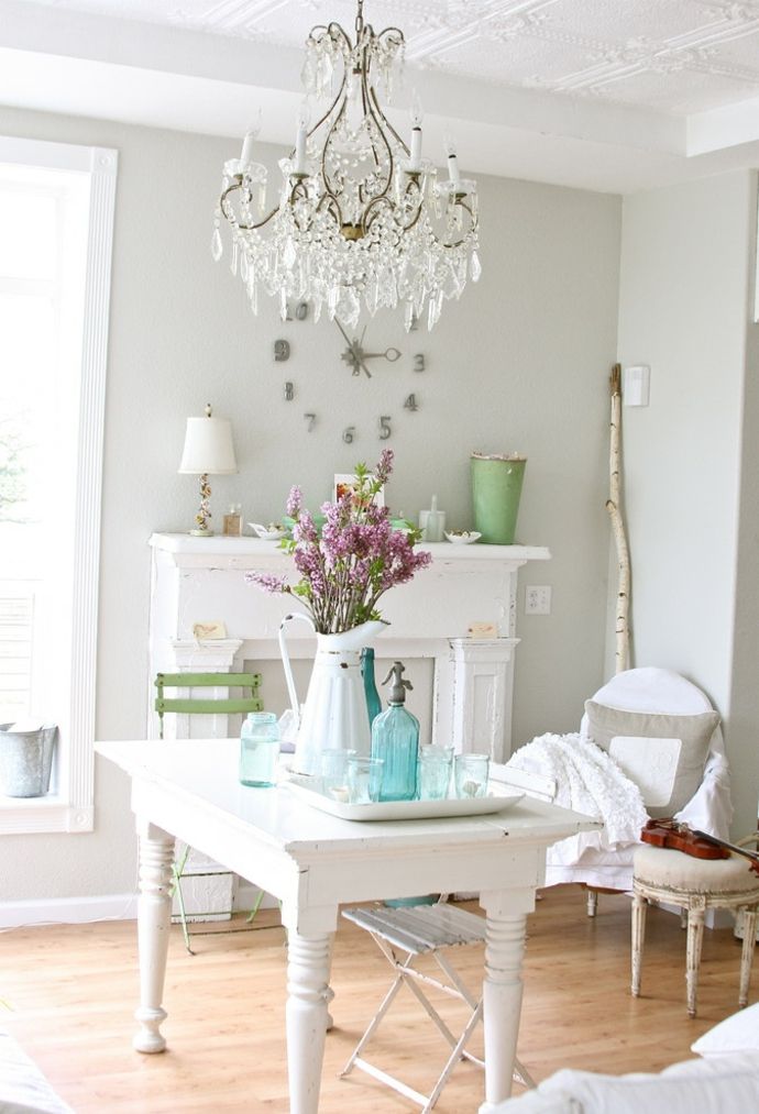 Living room table chandelier fireplace console armchair flowers white delicate -habby chic furniture