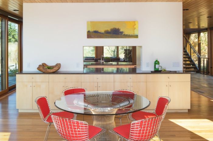 Extraordinary furnishings with a table made of glass and chairs in red-Extraordinary furnishings with a table made of glass and chairs in red