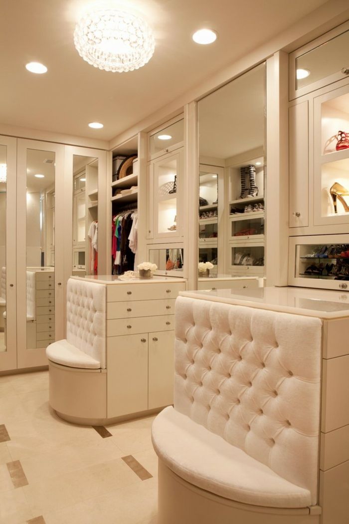 Walk-in closet in white with full-length mirrors and seating-Open walk-in closet system luxury dressing room
