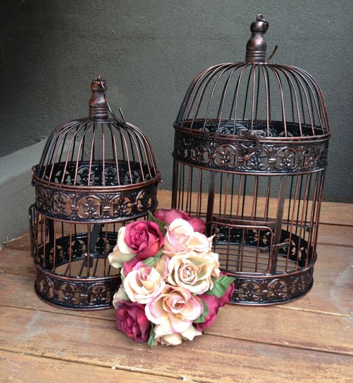 Decorative bird cages as accessories decoration ideas antique bird cages living room bouquet of flowers garden design