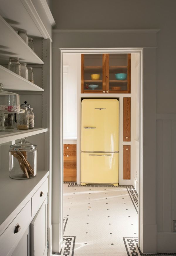 The pretty refrigerator as an independent piece of furniture in the kitchen-retro refrigerator