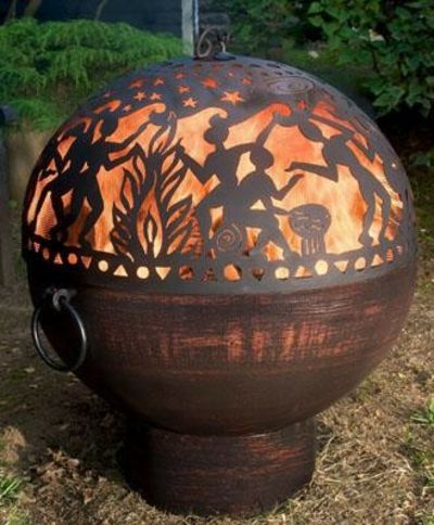 Engraved sphere in wooden garden decoration