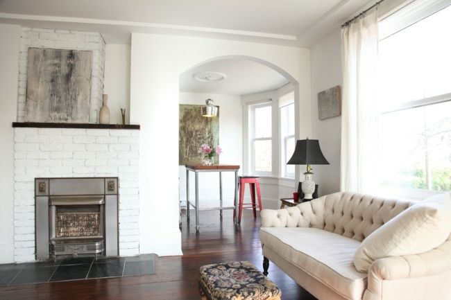 Eclectic living room in white with gas fireplace-Eclectic apartment vintage rustic