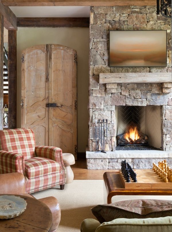 Achieve cosiness in the interior - checkered pattern wing armchairs Stone fireplace Comfort checkerboard