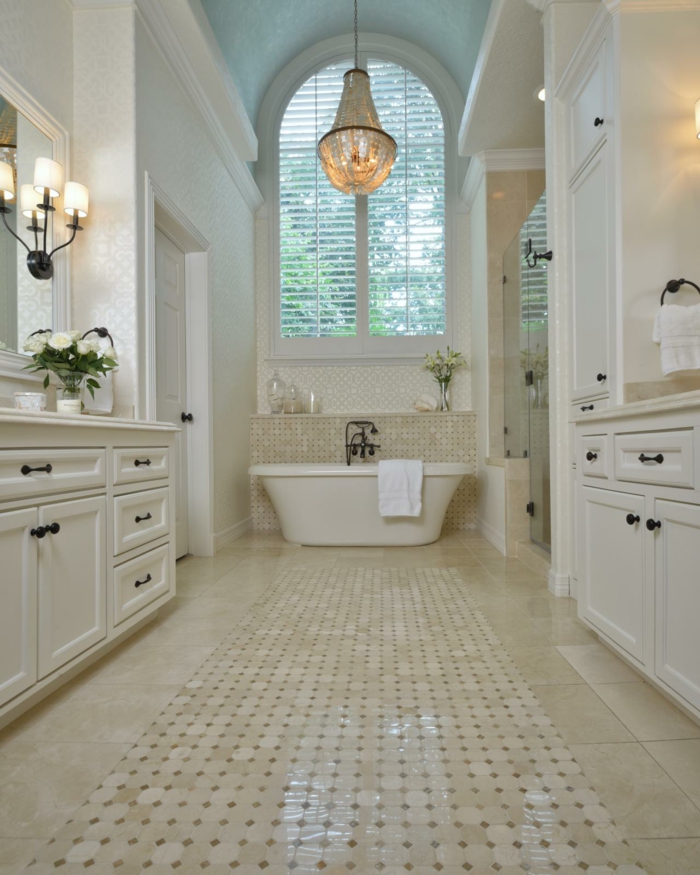 Spacious bathroom with a magnificent chandelier-freestanding bathtub