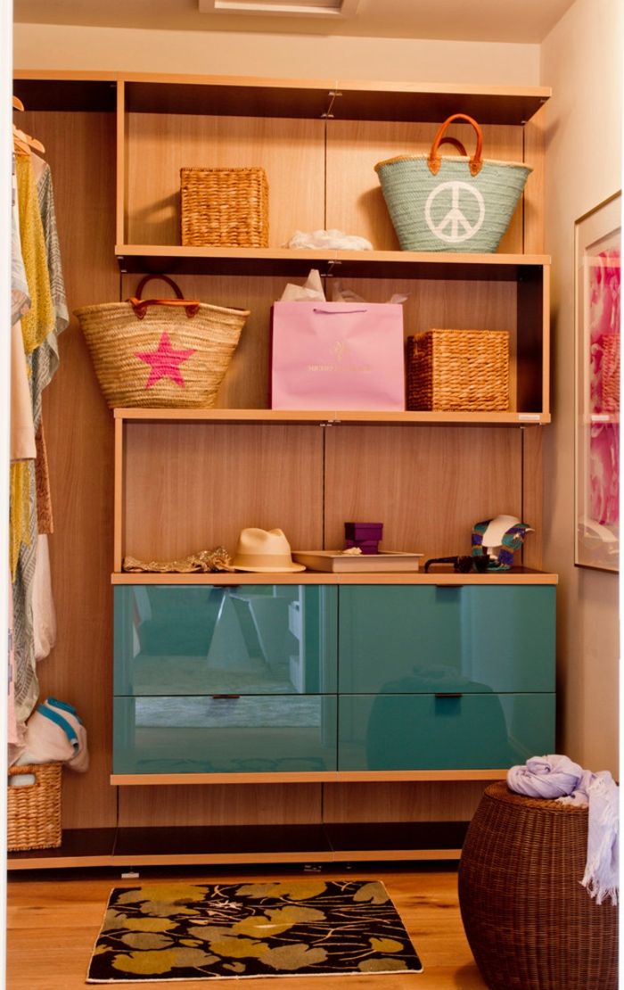 Wooden elements and maritime style-open walk-in closet system holiday home