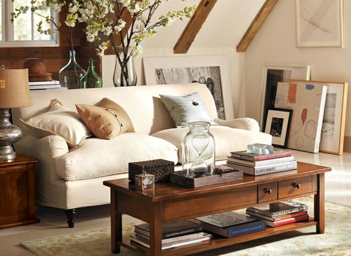 Classic English rolled arm sofa, here in a beige sofa design