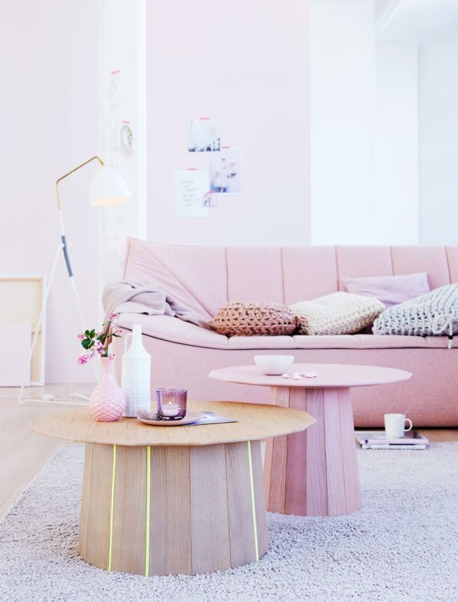 Nude colors in the home decor, pink armchairs, round wooden coffee table - furniture design