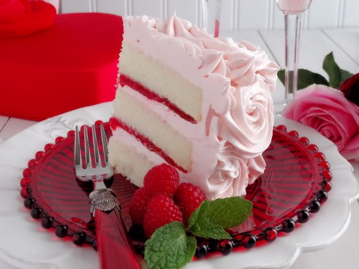 Velvet cake in pink-Delicious solution for Valentine's Day dessert Pink strawberries, heart-shaped Valentine's Day