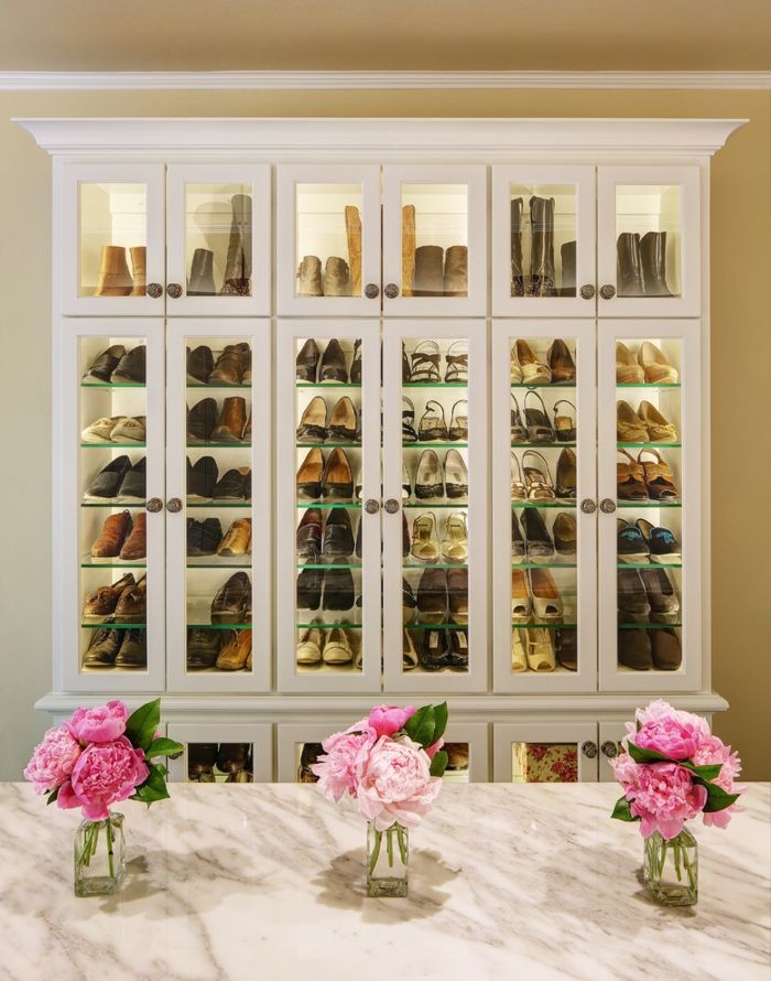 Shoe storage for the modern woman-Open walk-in closet glass showcases white
