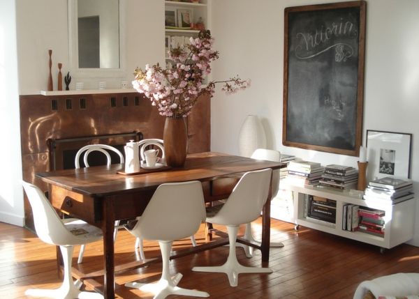 Dining room in eclectic style-rustic wooden table modern chairs