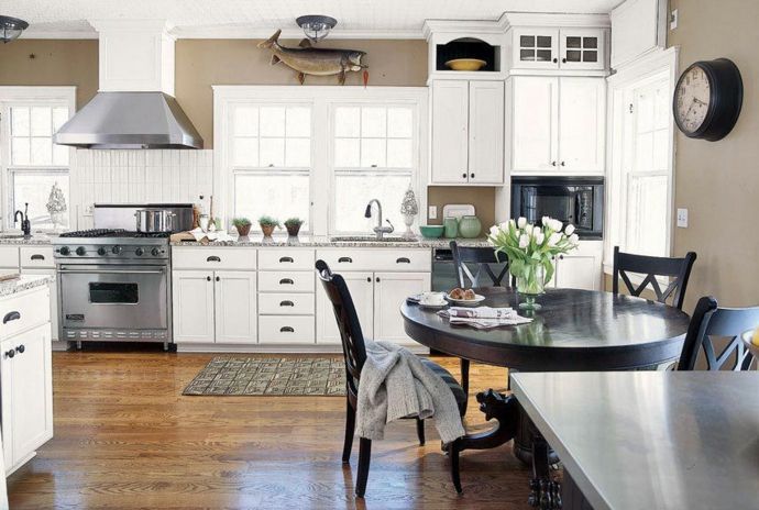 Taupe wall color white cabinets dark wood table kitchen furniture design