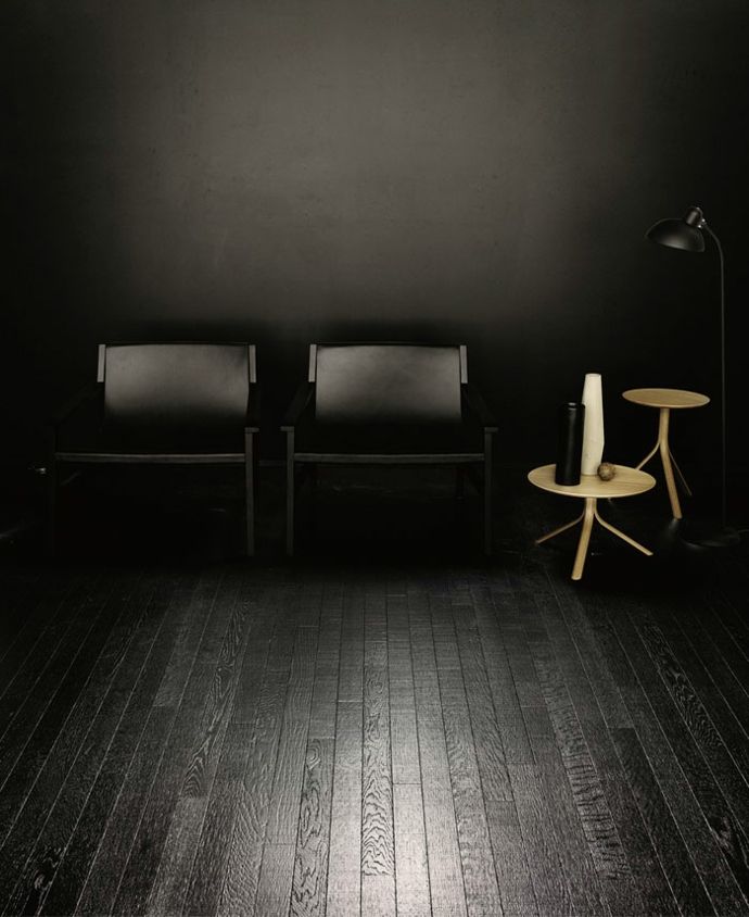 Living room furniture and wooden floor in black deco living room