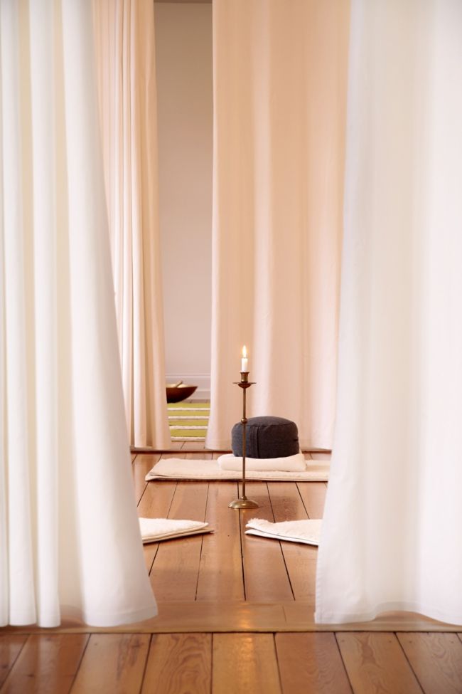 Yoga room, curtains, candle light, wooden floor