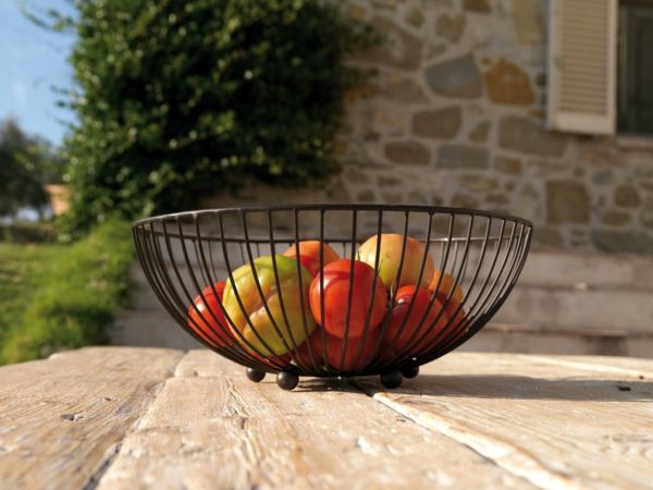 this iron bowl looks beautiful outdoors - home accessories ideas