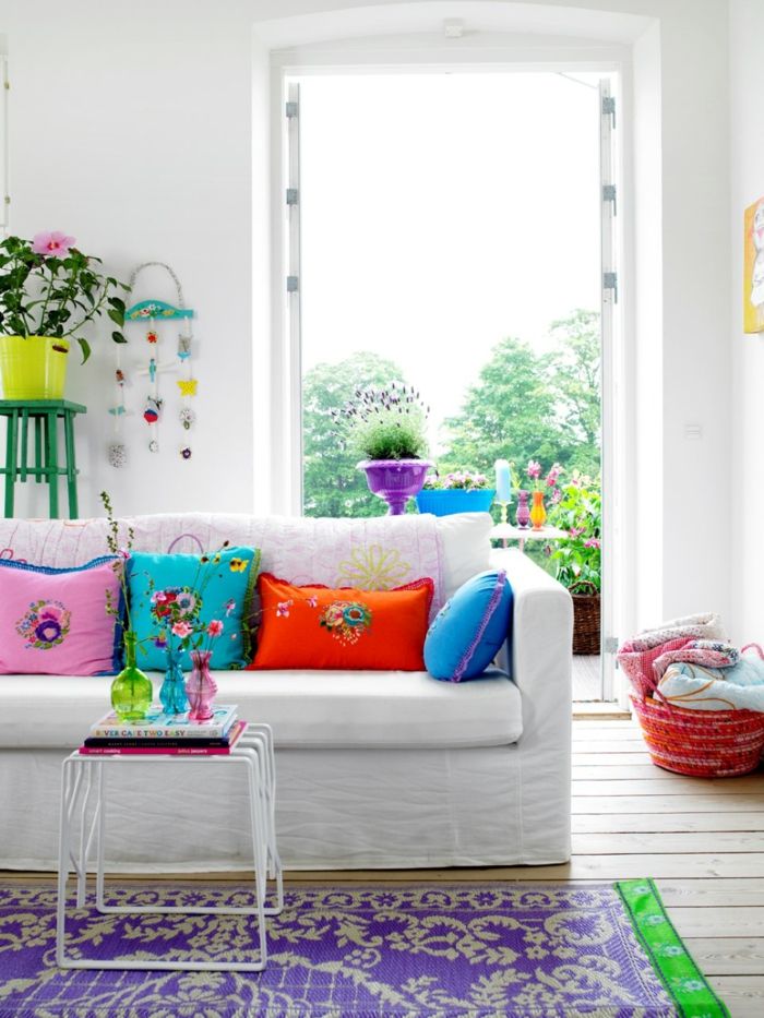 floral motifs and strong color sofa cushions