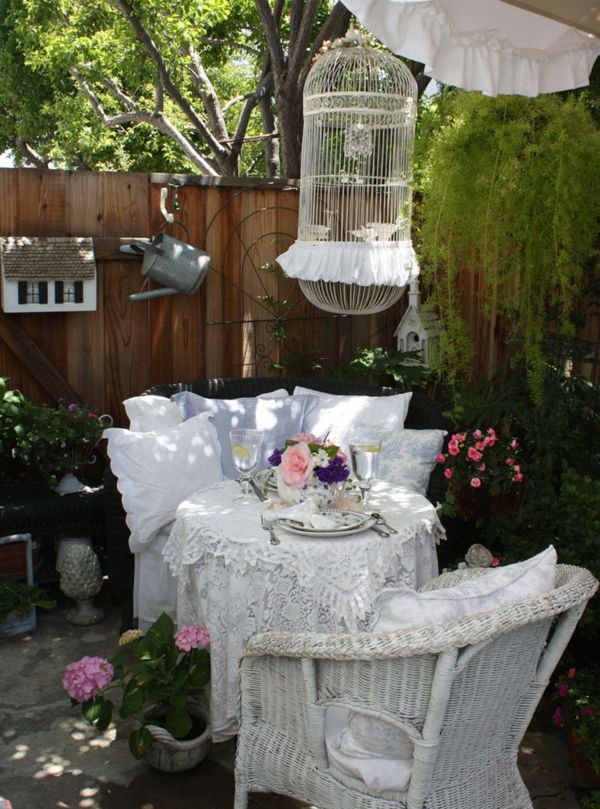 The flowers in pink and purple set romantic accents - garden furniture decoration