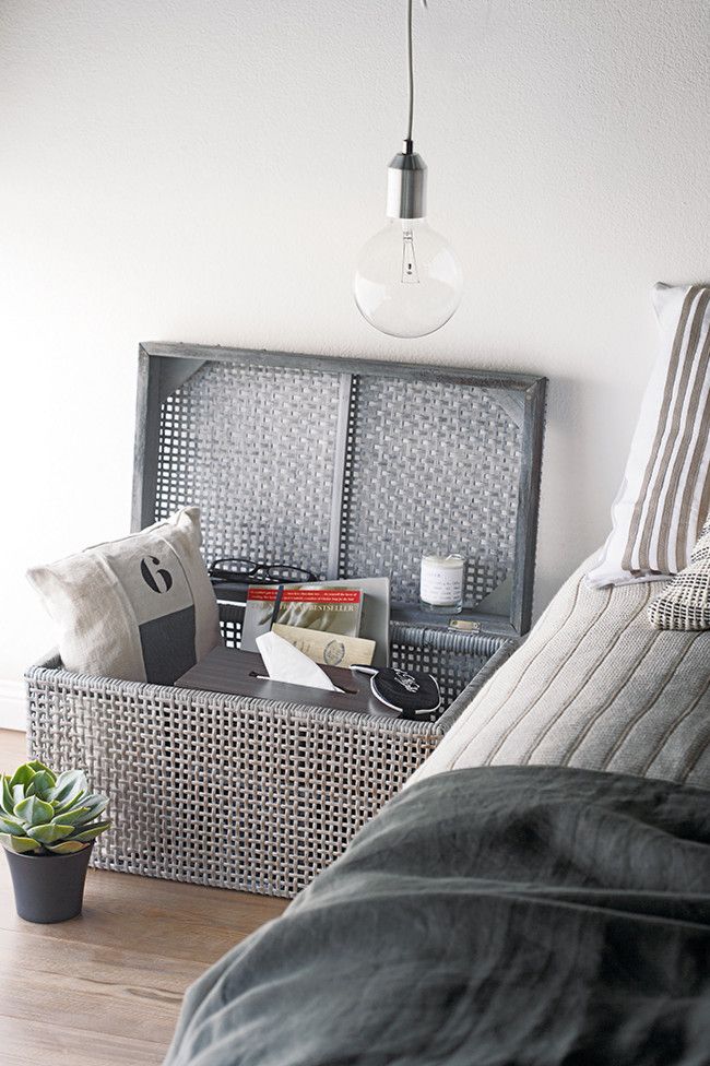 The wicker chest makes the bedroom look even more cozy - bedside table ideas