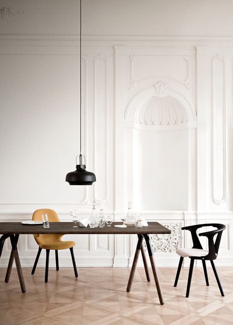 Individual pendant light above the dining table as a highlight in the interior pendant light hanging light