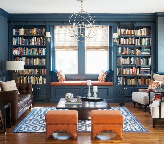 Cozy reading corner at the window-living room dark blue orange library