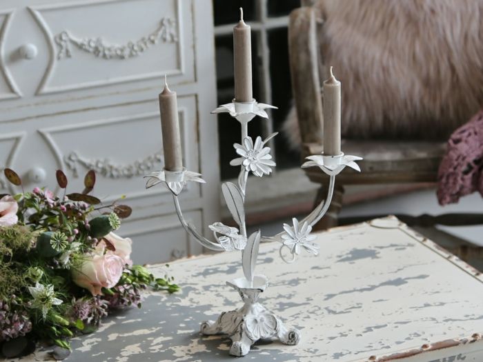 Candlesticks in white and a shabby chic furniture idea for living