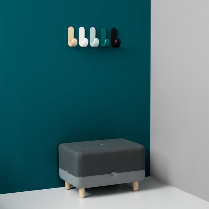 Modern, differently lacquered wall hooks for the entrance area coat hooks
