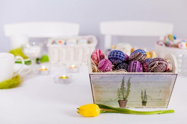 Easter table decoration wooden basket tulips