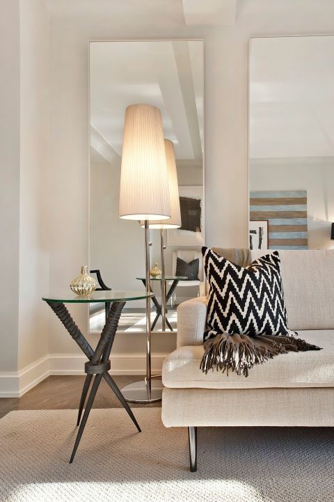 Living room beige sofa herringbone pattern decorative pillows