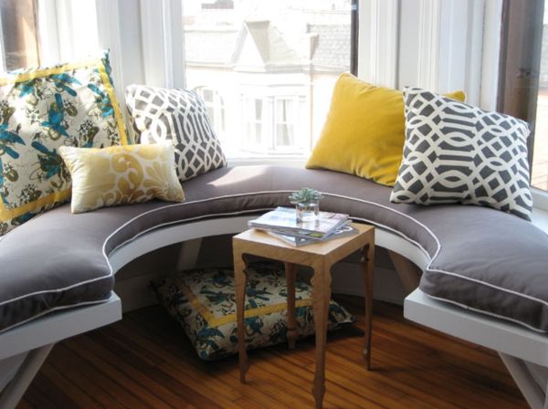 Bay window bench round decorative cushion mustard yellow light gray