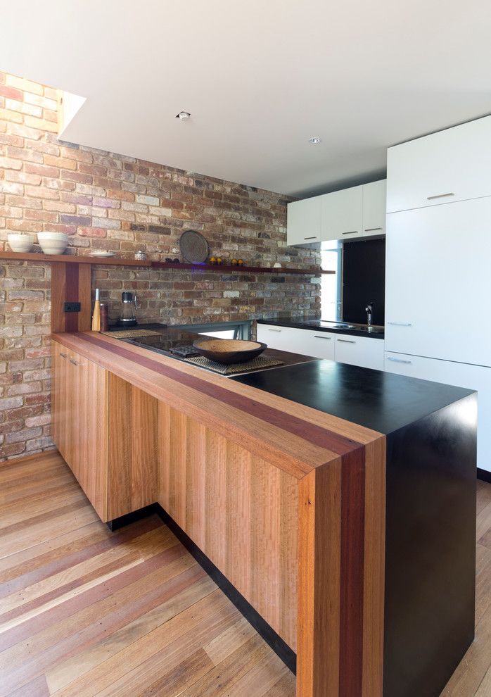 Kitchen brick wall wood look white fronts