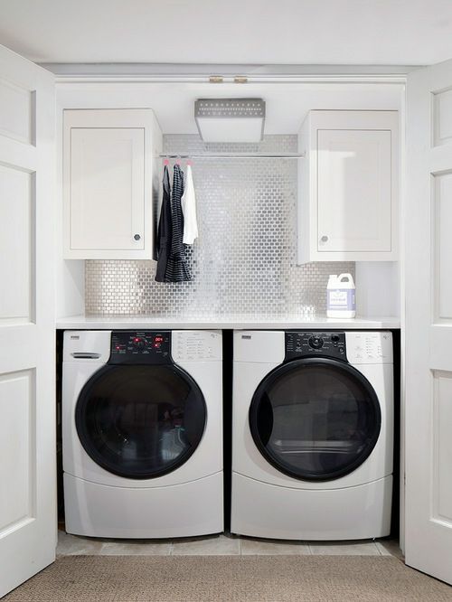 Luxury chic laundry room glossy white wall surface