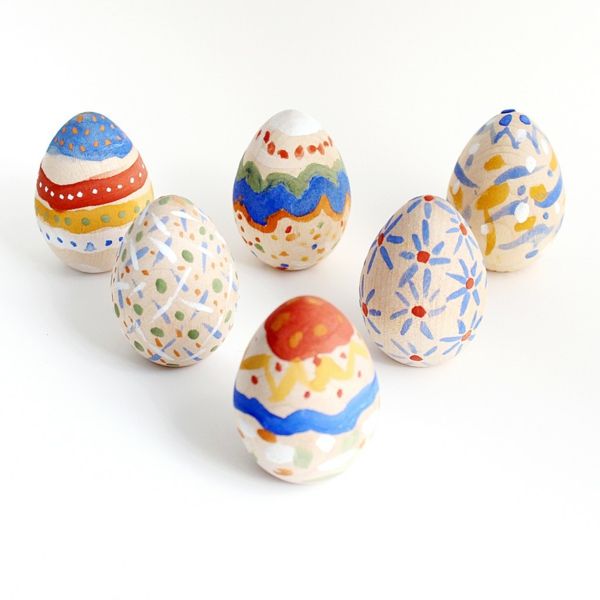 Easter decorations painting ideas hand painted children wooden Easter eggs