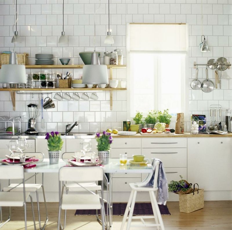 Lively kitchen with a white dining table