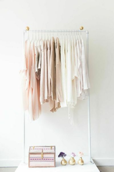 Clothes rail, minimalist frame, pastel tones