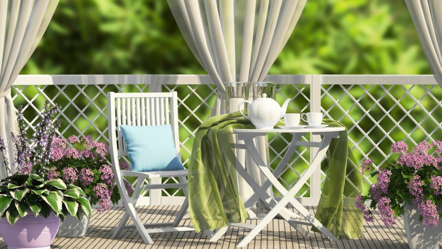 Opaque curtains on the balcony give your small outdoor area a cozy and romantic atmosphere