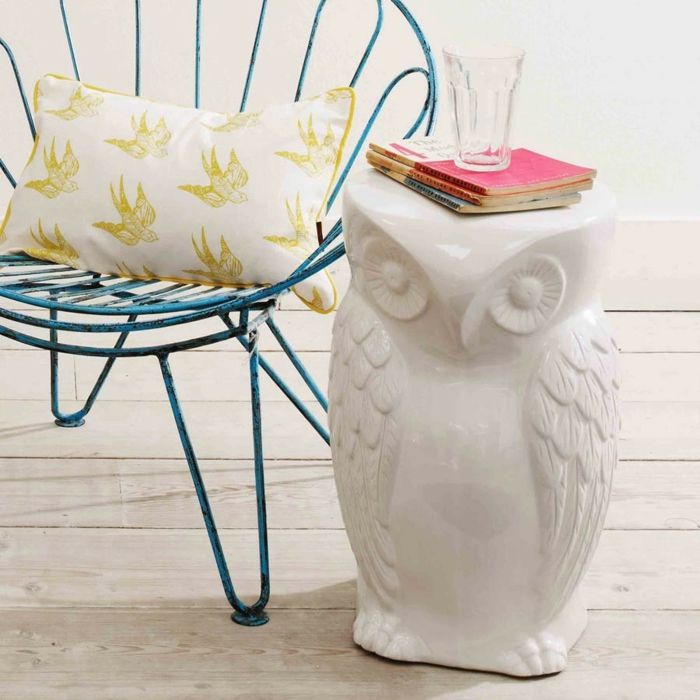 Ceramic owl as a living accessory and side table in white