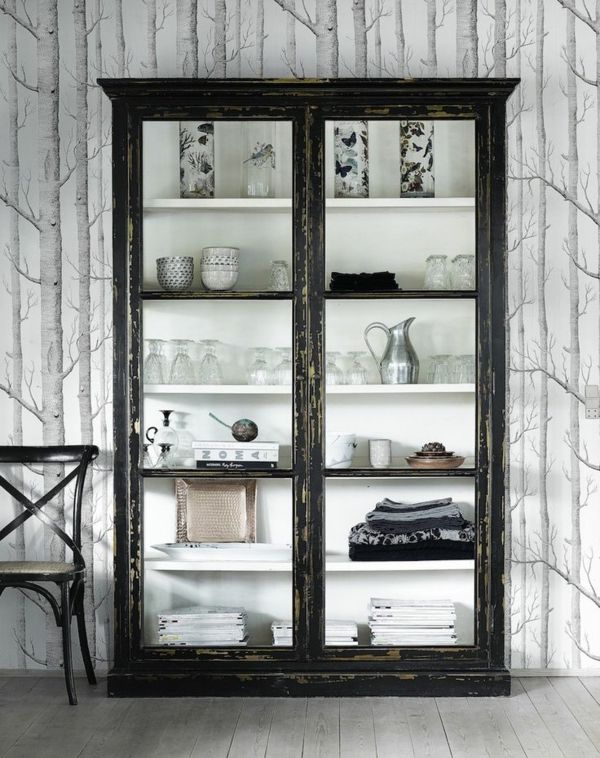 Kitchen cabinet with glass showcase for the dishes made of glass and porcelain