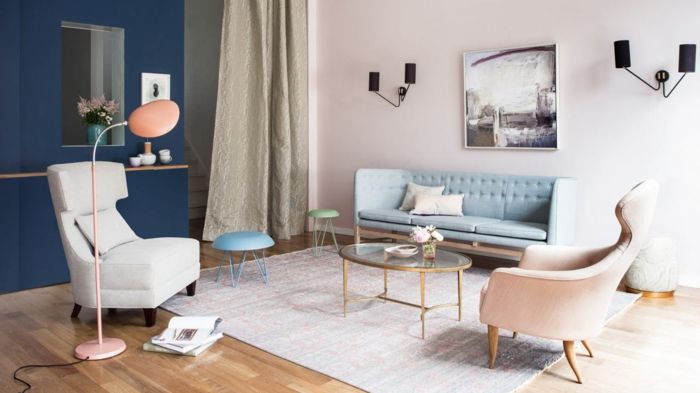 Pastel colors interior design living room wall lamp black dark blue wing chair upholstered sofa
