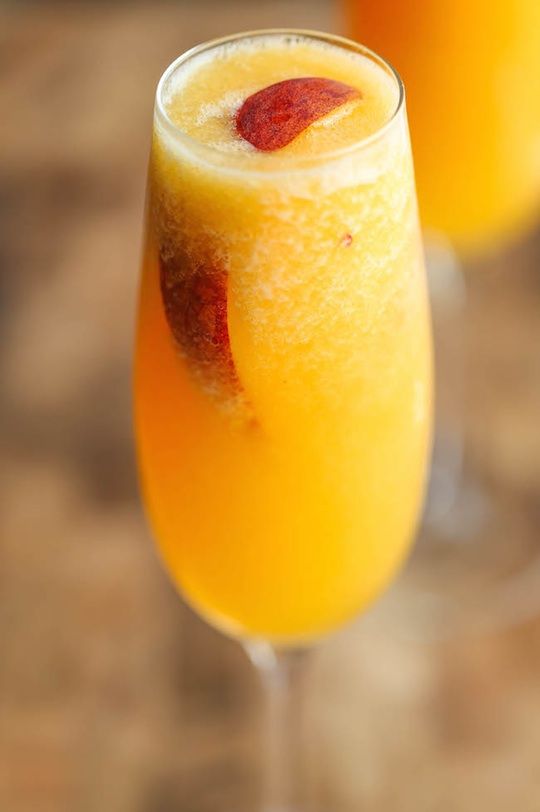 Bellini drink with ice.
