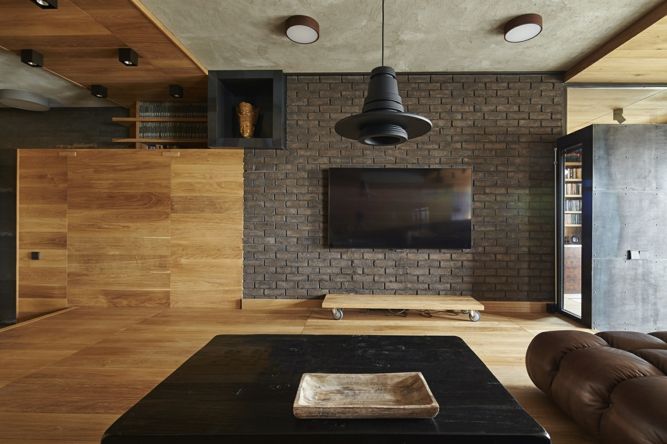 Living idea trendy industrial oak drawers Alexey Rozenberg living room brick wall wooden floor concrete ceiling