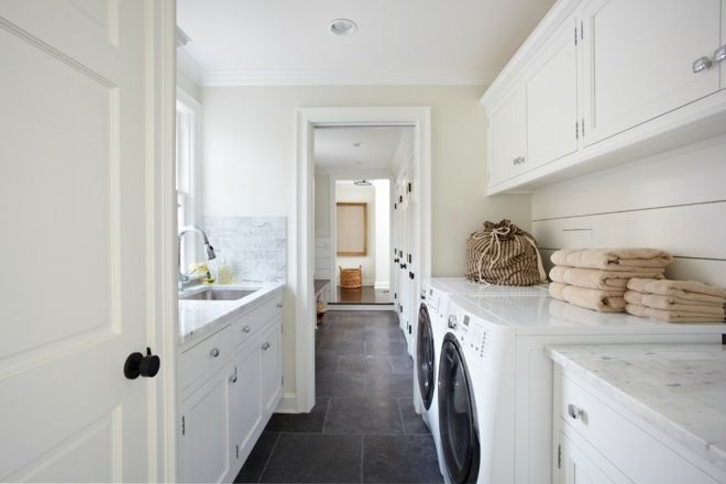 black tiles interior design laundry room white towels
