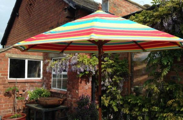 Colorful garden umbrella with a large diameter