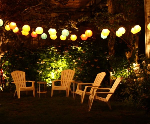 Fairy lights are easily wrapped around trees, garden furniture and parasols