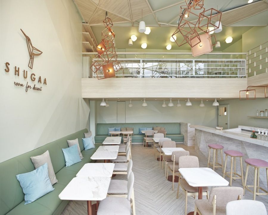 Upholstered seating in pastel tones Interior fittings The coffee house