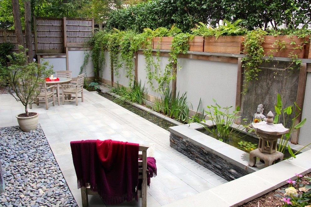 Garden wall made of concrete blocks garden furniture chairs tables