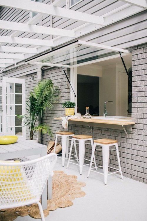 white bar stool bricks outdoor kitchen
